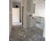 Spacious kitchen area featuring neutral walls and floors and lots of natural light at 21 Mildred Pl, Broadway, NC 27505