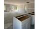 Open-concept living space featuring neutral walls and floors and lots of natural light, ready for personalization at 21 Mildred Pl, Broadway, NC 27505