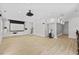 Finished basement area featuring a projector and screen, a gym and a bar at 219 Arbordale Ct, Cary, NC 27518