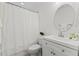 Cozy bathroom with a toilet, vanity and shower with a curtain at 219 Arbordale Ct, Cary, NC 27518