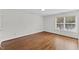 Spacious living room with hardwood flooring and natural light at 219 Arbordale Ct, Cary, NC 27518
