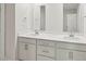 Bathroom features dual sinks, a white quartz counter, and shaker cabinets at 2202 Cherry Creek Rd, Haw River, NC 27258