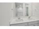 Bright bathroom with double sink vanity and stylish mirrors offering plenty of counter space at 2202 Cherry Creek Rd, Haw River, NC 27258