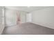 Neutral bedroom with an ensuite door and ample space provides a comfortable retreat at 2202 Cherry Creek Rd, Haw River, NC 27258