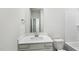 Bathroom features a quartz countertop vanity and tub shower with subway tile at 2206 Cherry Creek Rd, Haw River, NC 27258