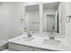 Bright bathroom features double vanity with modern sinks and fixtures at 2206 Cherry Creek Rd, Haw River, NC 27258