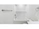 Bright bathroom features a tub with white subway tile surround at 2206 Cherry Creek Rd, Haw River, NC 27258
