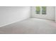 Bright bedroom featuring neutral walls and a view of the window at 2206 Cherry Creek Rd, Haw River, NC 27258