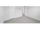 Neutral bedroom features two paneled doors and light gray carpet at 2206 Cherry Creek Rd, Haw River, NC 27258