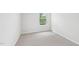 Bright bedroom with a window providing natural light at 2206 Cherry Creek Rd, Haw River, NC 27258