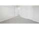 Bright bedroom featuring neutral walls, carpet flooring, and closet doors at 2206 Cherry Creek Rd, Haw River, NC 27258