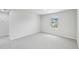 Neutral bedroom features soft carpet, bright window, and ample space at 2206 Cherry Creek Rd, Haw River, NC 27258