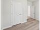 This bedroom features light-colored flooring and neutral paint colors at 2206 Cherry Creek Rd, Haw River, NC 27258
