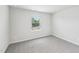 Bright bedroom with a window providing natural light and a view of the outdoors at 2206 Cherry Creek Rd, Haw River, NC 27258