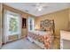 Bright bedroom with natural light, a comfortable bed, and decorative accents at 2208 Walden Creek Dr, Apex, NC 27523
