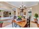 Elegant dining room with chandelier and hardwood floors at 2208 Walden Creek Dr, Apex, NC 27523