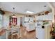 Spacious kitchen with breakfast table and adjacent sitting area at 2208 Walden Creek Dr, Apex, NC 27523