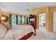 Spacious main bedroom boasting natural light and adjoining bathroom at 2208 Walden Creek Dr, Apex, NC 27523