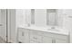 Bathroom features double vanity with white countertop and modern fixtures at 2210 Cherry Creek Rd, Haw River, NC 27258