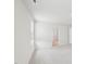 Bedroom boasts neutral carpet, light-colored walls, with multiple windows for natural light at 2210 Cherry Creek Rd, Haw River, NC 27258
