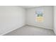 Bedroom with a window that provides view of houses under construction at 2210 Cherry Creek Rd, Haw River, NC 27258