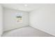Bright bedroom featuring carpet and a window with a view of the outdoors at 2210 Cherry Creek Rd, Haw River, NC 27258
