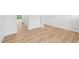 Open living space featuring luxury vinyl floors and lots of natural light at 2210 Cherry Creek Rd, Haw River, NC 27258