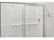 Modern shower with white subway tile and glass doors at 2210 Cherry Creek Rd, Haw River, NC 27258