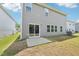 The home's backyard features a concrete patio and lawn space at 2211 Cherry Creek Rd, Haw River, NC 27258