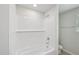 A tiled shower-tub combination makes for a clean, bright, and modern bathroom at 2211 Cherry Creek Rd, Haw River, NC 27258