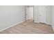 Bedroom features hardwood floors and neutral wall colors at 2211 Cherry Creek Rd, Haw River, NC 27258