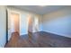 Bright bedroom with hardwood floors and ensuite bathroom at 229 Gilliland Rd, Siler City, NC 27344