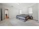Spacious bedroom with a view to the living space and a minimalist modern style at 233 Airlie Dr, Chapel Hill, NC 27516