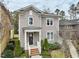 Inviting two-story home with well-manicured yard and brick steps leading to the front door at 233 Airlie Dr, Chapel Hill, NC 27516