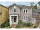Charming two-story home boasts a welcoming entrance and well-maintained landscaping at 233 Airlie Dr, Chapel Hill, NC 27516