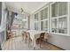 Screened patio featuring outdoor dining set and view of backyard at 233 Airlie Dr, Chapel Hill, NC 27516