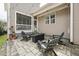 Stone patio featuring modern outdoor seating and exterior home siding at 233 Airlie Dr, Chapel Hill, NC 27516