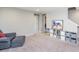 Finished basement featuring neutral carpeting, a comfortable seating area, and storage at 237 Begen St, Morrisville, NC 27560