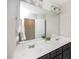 Bathroom features a dual sink vanity and is well lit with recessed lighting and a large mirror at 237 Begen St, Morrisville, NC 27560
