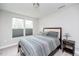 Serene bedroom with a queen-sized bed, neutral decor, and bright natural light from the windows at 237 Begen St, Morrisville, NC 27560