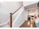 Elegant entryway featuring hardwood floors, staircase, and views into the dining and living areas at 237 Begen St, Morrisville, NC 27560