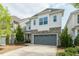 Charming home with a two-car garage, stone accents and manicured landscaping at 237 Begen St, Morrisville, NC 27560