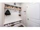 Bright mudroom with a built-in bench, cubbies, and hooks for organization near the entrance at 237 Begen St, Morrisville, NC 27560