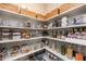 Well-organized pantry features white shelving, woven baskets, and clear storage containers at 237 Begen St, Morrisville, NC 27560