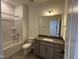 Standard bathroom featuring a tub/shower combination and vanity at 2401 Whitewing Ln, Wendell, NC 27591