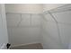 Walk-in closet with carpet flooring and wire shelving at 2401 Whitewing Ln, Wendell, NC 27591