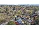 Picturesque aerial shot of a suburban area showcasing tree-lined streets and rooftops, highlighting residential architecture at 2605 Hazelwood Dr, Raleigh, NC 27608