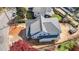 New home with a gray roof, set amidst greenery and under construction, seen from an aerial perspective at 2605 Hazelwood Dr, Raleigh, NC 27608