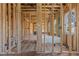 Interior framing of a bathroom with plumbing in place, showing tub and window at 2605 Hazelwood Dr, Raleigh, NC 27608