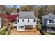 Back exterior view of a home with light gray siding with a deck under construction at 2605 Hazelwood Dr, Raleigh, NC 27608